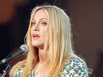 Мадонна. Фото с сайта madonna-concert.ru  Мадонна. Фото с сайта madonna-concert.ru